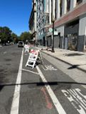 Image of barricade along 10th Street for reserved parking