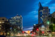 Image of downtown Sacramento buildings at night 
