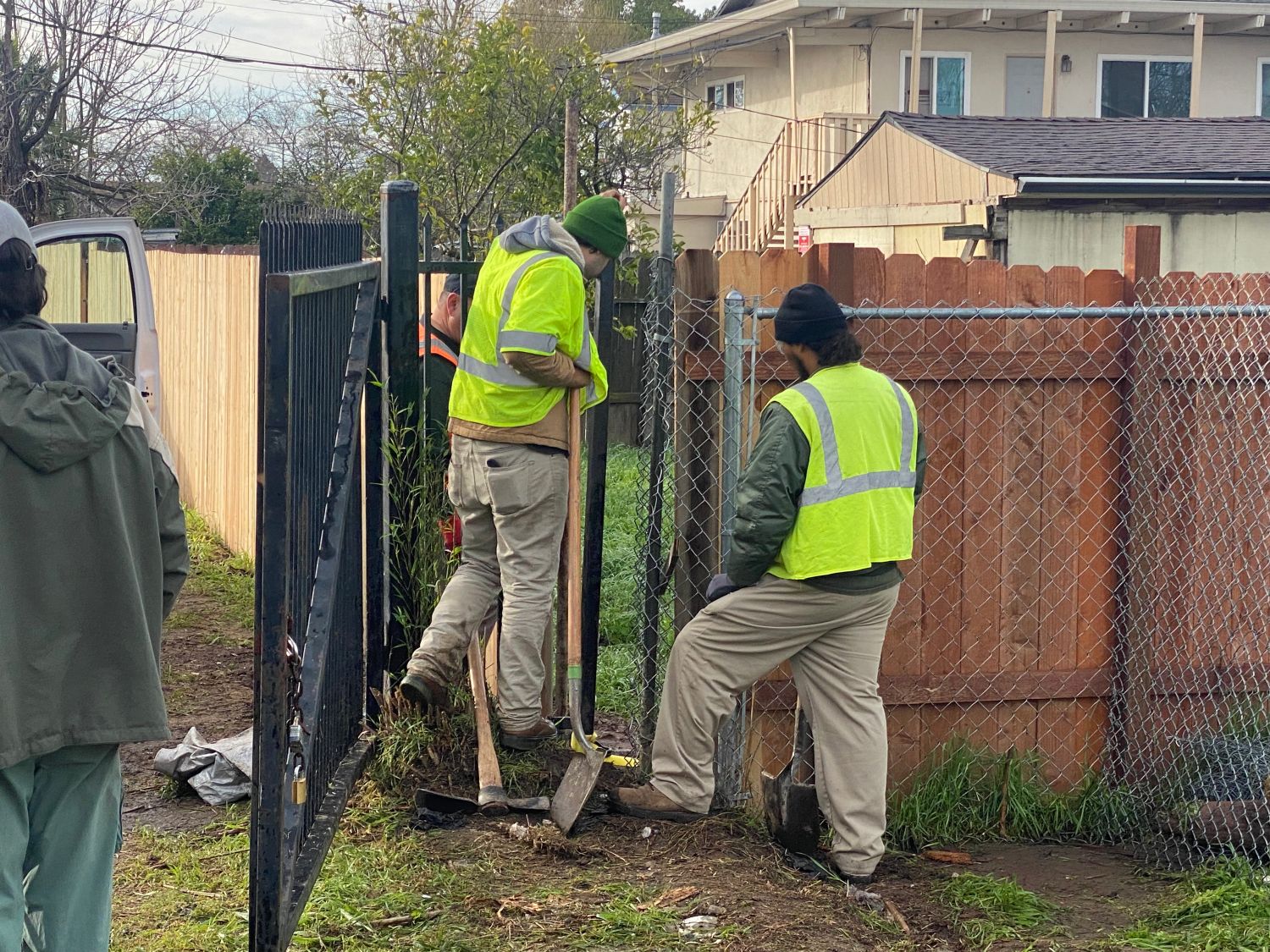 workers repairing fence