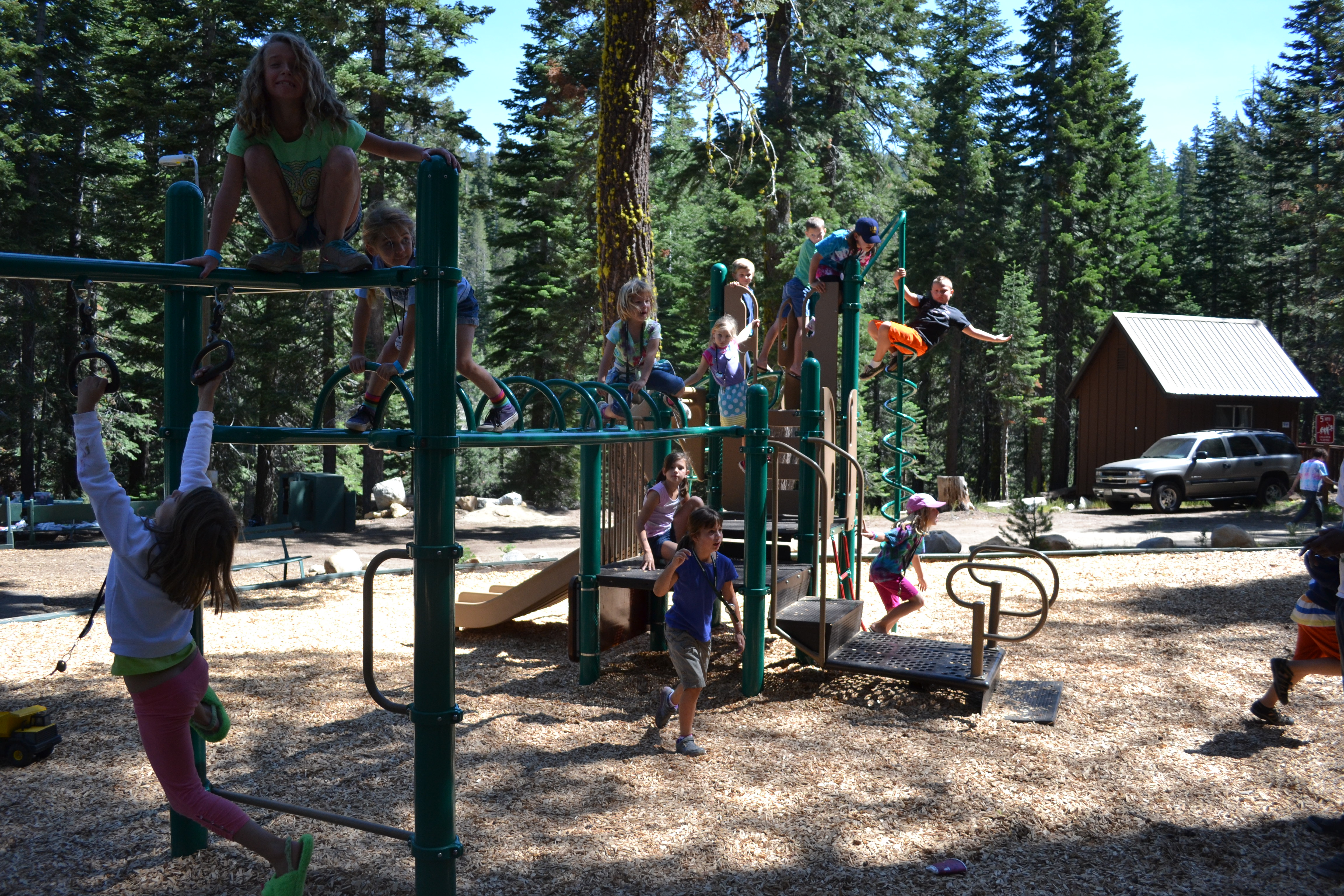 Image of kids playing on playground equipment