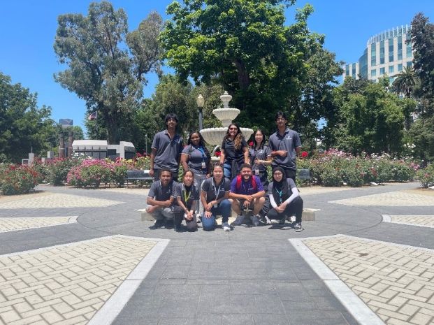 Group of youth in front of fountain